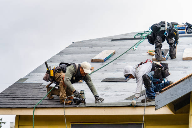 Professional Roofing technician working in Hawley, PA